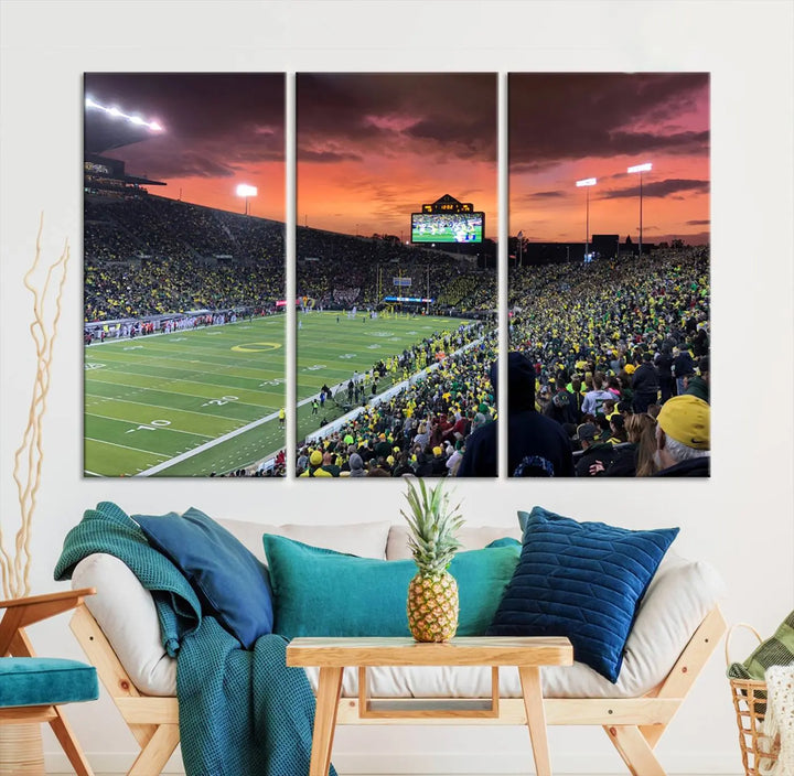 A premium canvas featuring the University of Oregon Ducks football team at Eugene's Autzen Stadium at sunset adorns the wall. Handmade in the USA, this elegant piece captures the vibrant energy of the scene.