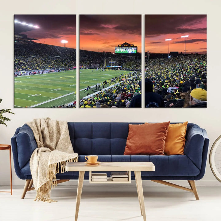 A premium canvas featuring the University of Oregon Ducks football team at Eugene's Autzen Stadium at sunset adorns the wall. Handmade in the USA, this elegant piece captures the vibrant energy of the scene.