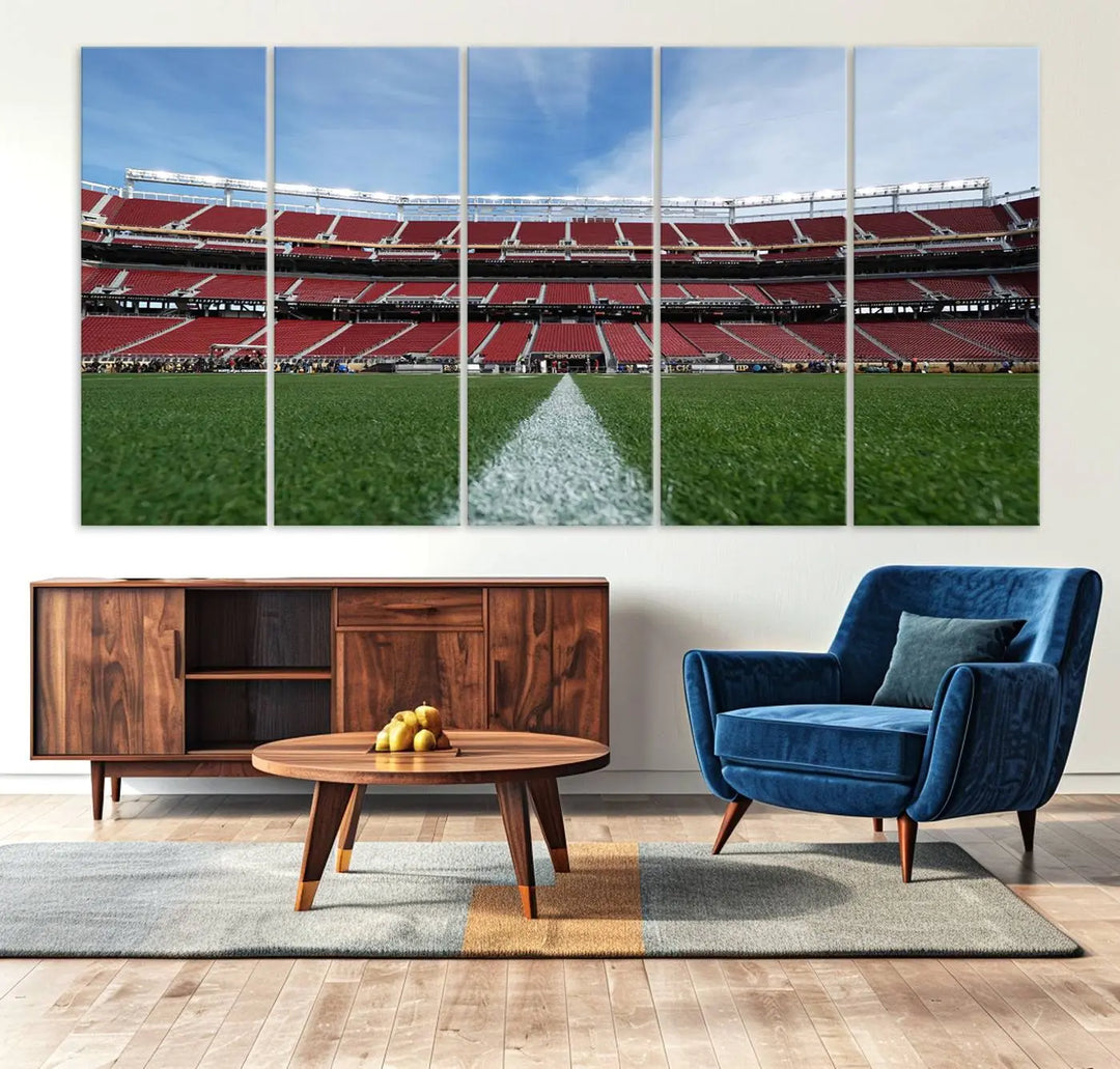 In the dining room, a University of Tulsa Golden Hurricane Football Team Print - Tulsa H.A. Chapman Stadium wall art canvas print is prominently displayed as a large triptych, enhanced by soft lighting.