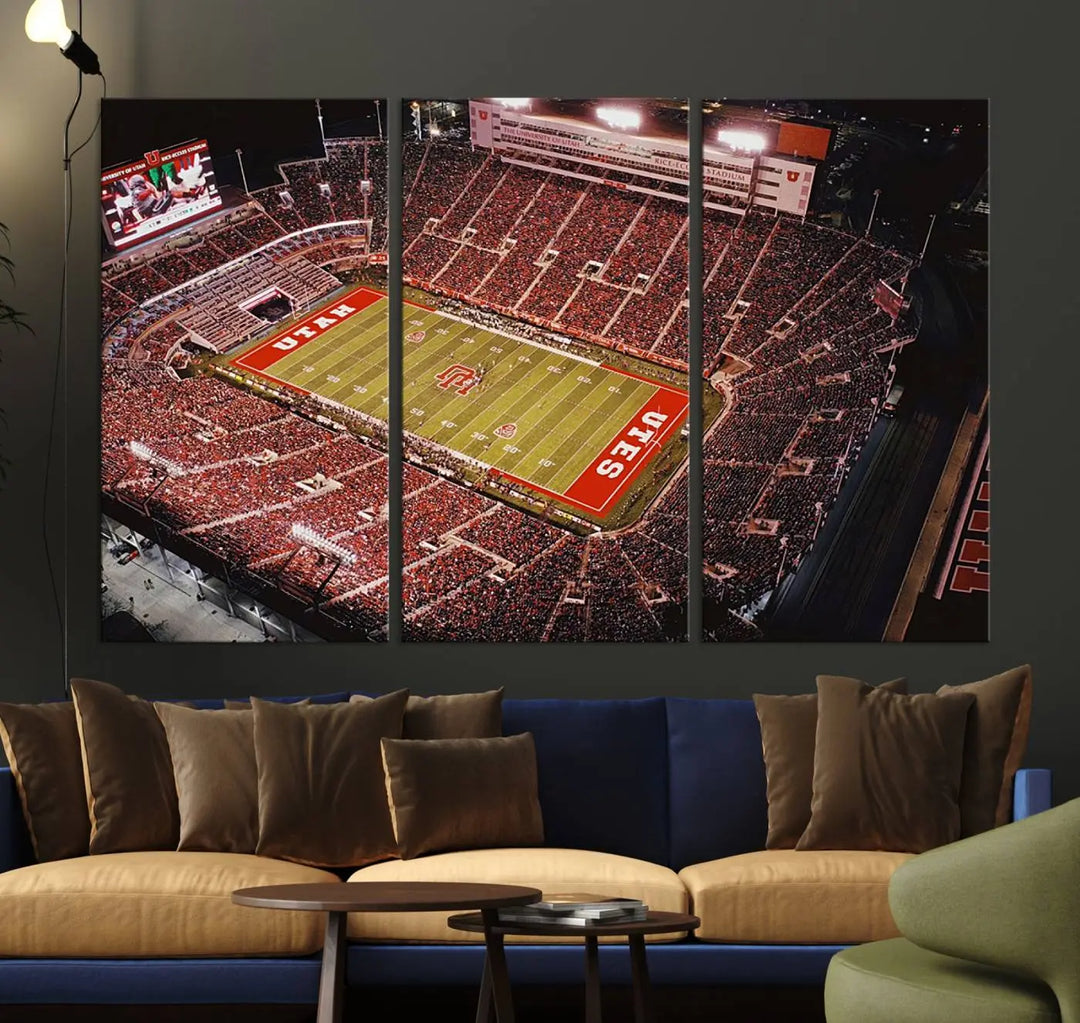 The modern living room is adorned with a Utah Utes Football Team Print - Salt Lake City Rice-Eccles Stadium Wall Art Canvas Print, depicting a packed football stadium.