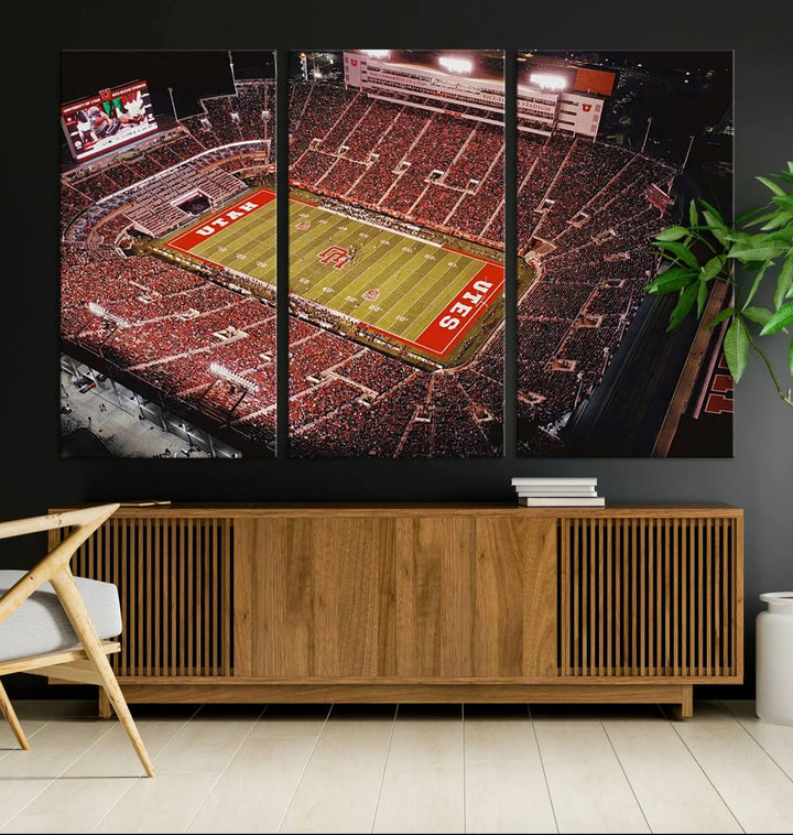 The modern living room is adorned with a Utah Utes Football Team Print - Salt Lake City Rice-Eccles Stadium Wall Art Canvas Print, depicting a packed football stadium.