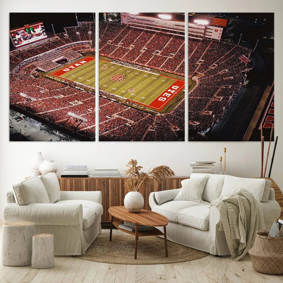 The modern living room is adorned with a Utah Utes Football Team Print - Salt Lake City Rice-Eccles Stadium Wall Art Canvas Print, depicting a packed football stadium.