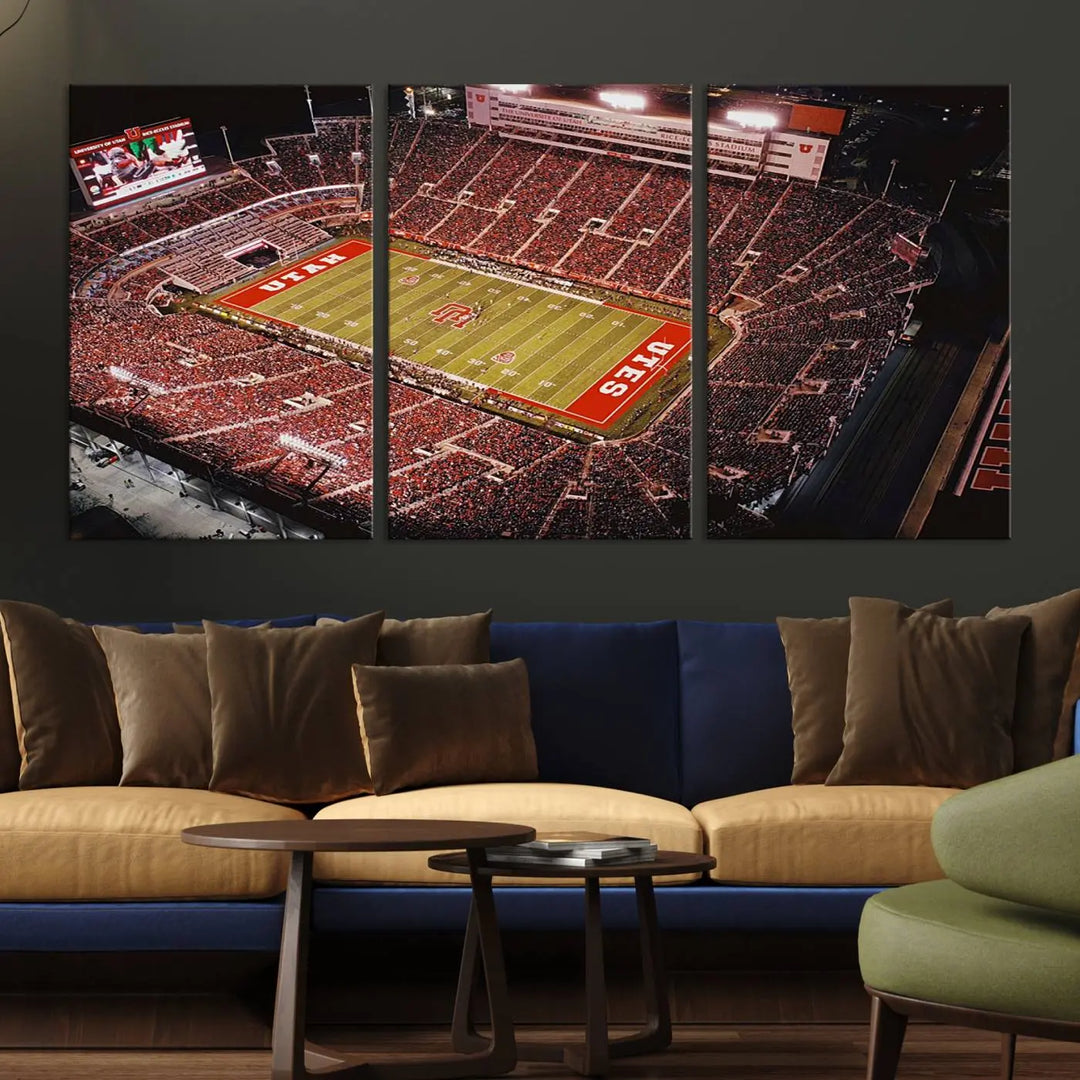 The modern living room is adorned with a Utah Utes Football Team Print - Salt Lake City Rice-Eccles Stadium Wall Art Canvas Print, depicting a packed football stadium.