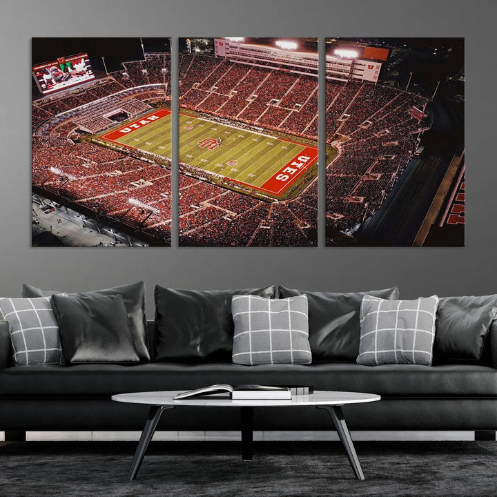 The modern living room is adorned with a Utah Utes Football Team Print - Salt Lake City Rice-Eccles Stadium Wall Art Canvas Print, depicting a packed football stadium.