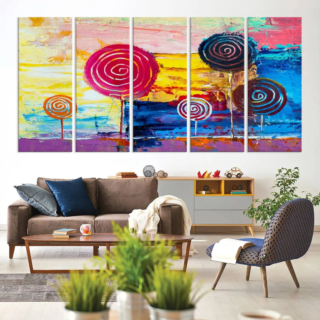 The Vibrant Lollipops Wall Art Canvas Print features a colorful abstract design of spiral trees set against a sunset background. This elegantly gallery-wrapped piece comes with a UV-protective coating, creating an impressive centerpiece in the room.