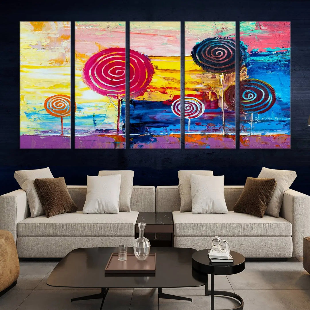 The Vibrant Lollipops Wall Art Canvas Print features a colorful abstract design of spiral trees set against a sunset background. This elegantly gallery-wrapped piece comes with a UV-protective coating, creating an impressive centerpiece in the room.