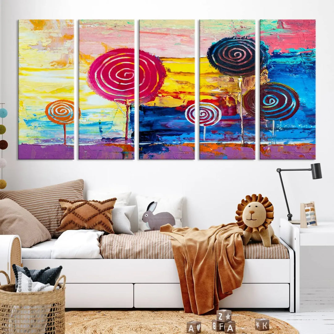 The Vibrant Lollipops Wall Art Canvas Print features a colorful abstract design of spiral trees set against a sunset background. This elegantly gallery-wrapped piece comes with a UV-protective coating, creating an impressive centerpiece in the room.