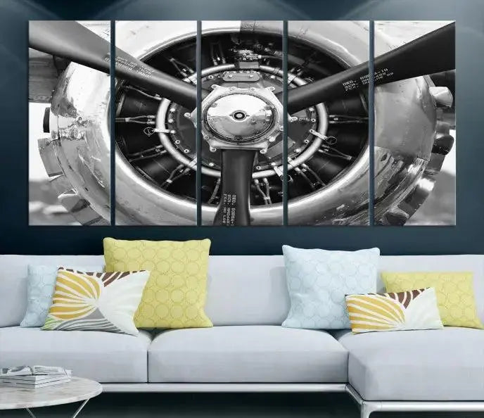 The Vintage Airplane Wall Art Canvas Print features a black and white image of an aircraft engine propeller elegantly divided into three panels.