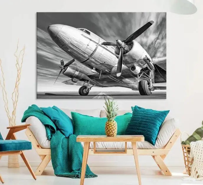 The Vintage Airplane on a Runway Canvas Print is elegantly showcased as a black and white triptych. Each panel is crafted on museum-quality canvases with a UV-protective coating for lasting beauty and durability. This timeless artwork comes with the convenience of free shipping.