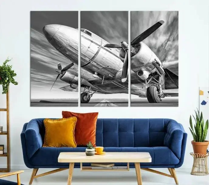 The Vintage Airplane on a Runway Canvas Print is elegantly showcased as a black and white triptych. Each panel is crafted on museum-quality canvases with a UV-protective coating for lasting beauty and durability. This timeless artwork comes with the convenience of free shipping.