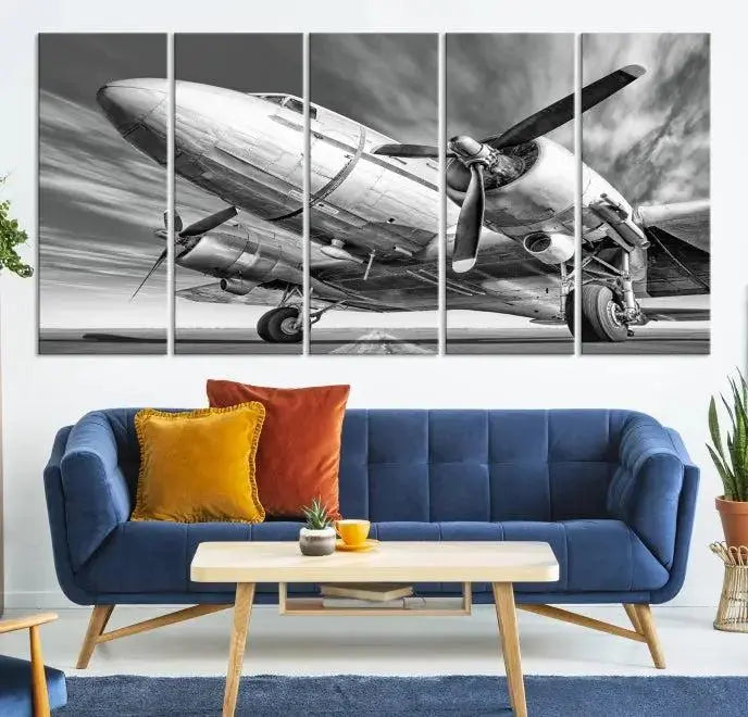 The Vintage Airplane on a Runway Canvas Print is elegantly showcased as a black and white triptych. Each panel is crafted on museum-quality canvases with a UV-protective coating for lasting beauty and durability. This timeless artwork comes with the convenience of free shipping.