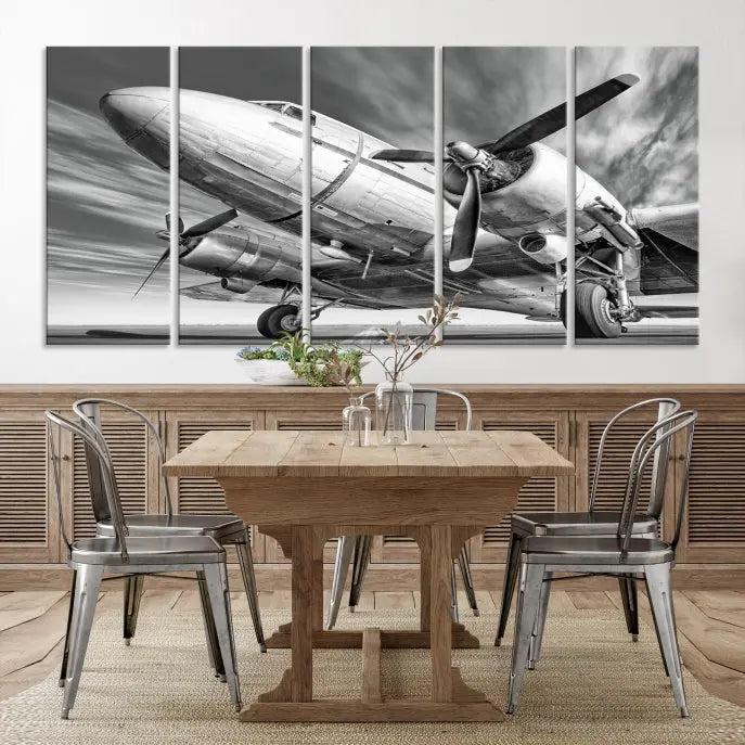 The Vintage Airplane on a Runway Canvas Print is elegantly showcased as a black and white triptych. Each panel is crafted on museum-quality canvases with a UV-protective coating for lasting beauty and durability. This timeless artwork comes with the convenience of free shipping.