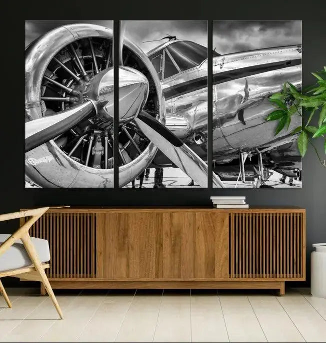 The Vintage Antique Airplane Wall Art Canvas Print, a black-and-white triptych of a propeller plane, exemplifies professional craftsmanship and adds an elegant touch to any space. This museum-quality canvas is an impressive display of artistic skill.