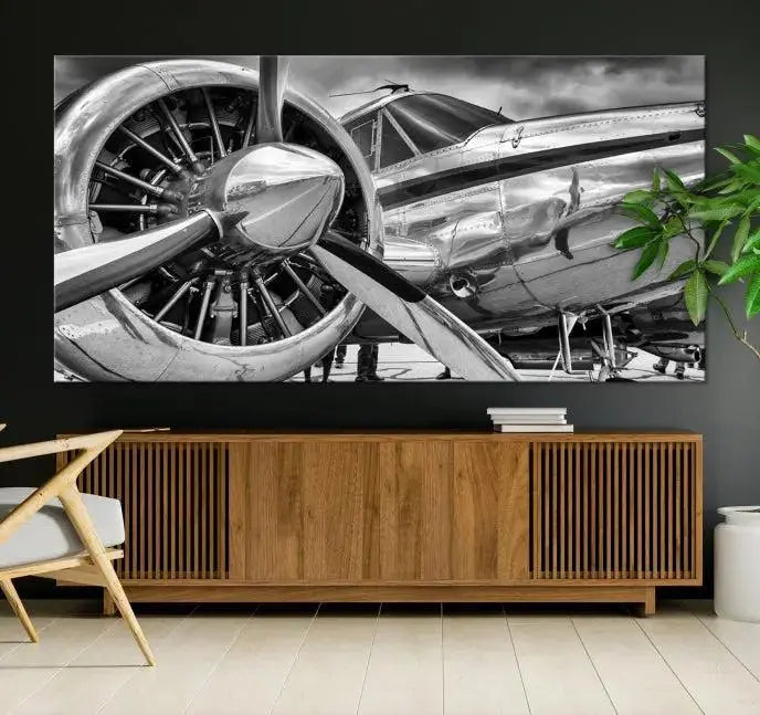 The Vintage Antique Airplane Wall Art Canvas Print, a black-and-white triptych of a propeller plane, exemplifies professional craftsmanship and adds an elegant touch to any space. This museum-quality canvas is an impressive display of artistic skill.