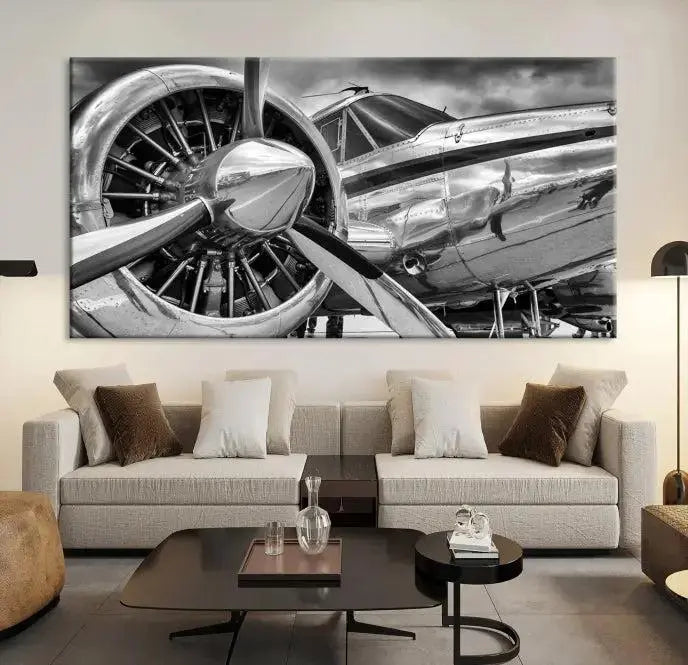 The Vintage Antique Airplane Wall Art Canvas Print, a black-and-white triptych of a propeller plane, exemplifies professional craftsmanship and adds an elegant touch to any space. This museum-quality canvas is an impressive display of artistic skill.