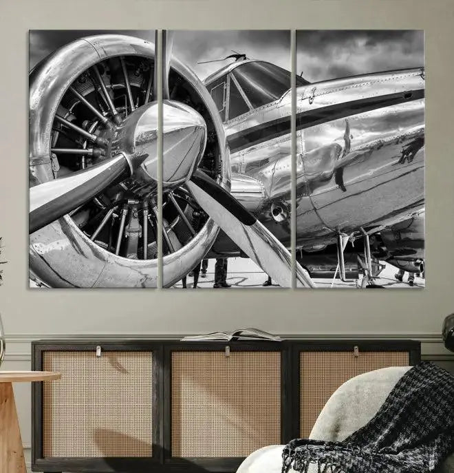 The Vintage Antique Airplane Wall Art Canvas Print, a black-and-white triptych of a propeller plane, exemplifies professional craftsmanship and adds an elegant touch to any space. This museum-quality canvas is an impressive display of artistic skill.