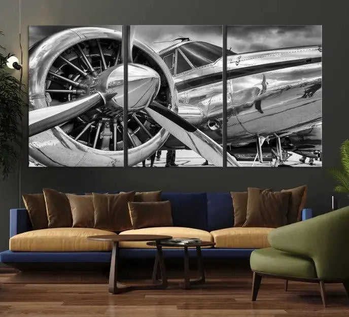 The Vintage Antique Airplane Wall Art Canvas Print, a black-and-white triptych of a propeller plane, exemplifies professional craftsmanship and adds an elegant touch to any space. This museum-quality canvas is an impressive display of artistic skill.