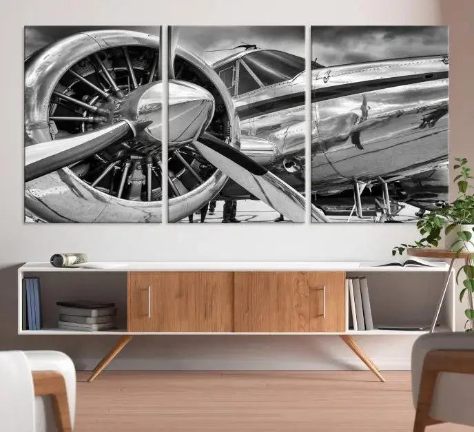 The Vintage Antique Airplane Wall Art Canvas Print, a black-and-white triptych of a propeller plane, exemplifies professional craftsmanship and adds an elegant touch to any space. This museum-quality canvas is an impressive display of artistic skill.