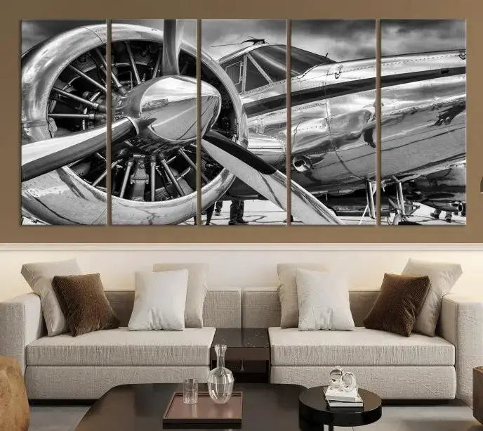 The Vintage Antique Airplane Wall Art Canvas Print, a black-and-white triptych of a propeller plane, exemplifies professional craftsmanship and adds an elegant touch to any space. This museum-quality canvas is an impressive display of artistic skill.