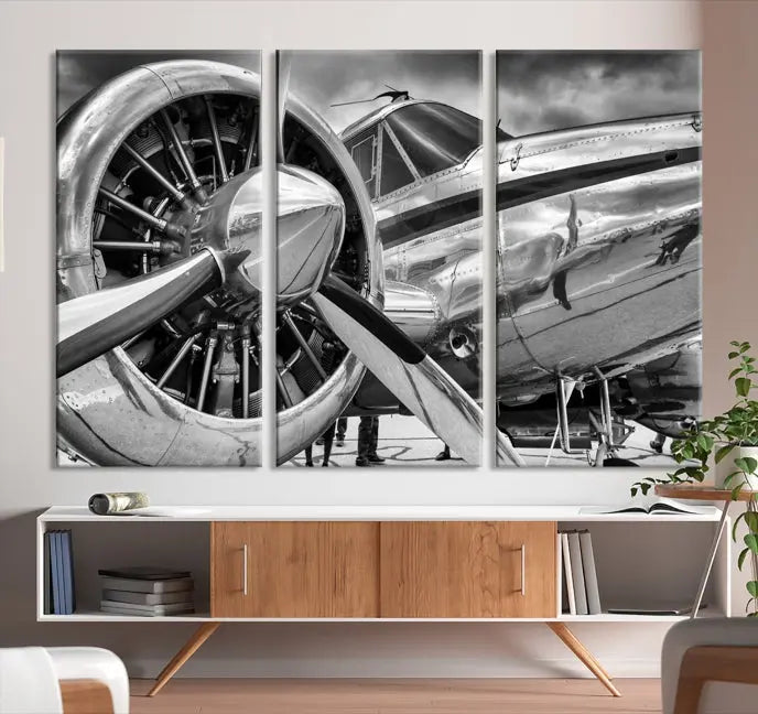 The Vintage Antique Airplane Wall Art Canvas Print, a black-and-white triptych of a propeller plane, exemplifies professional craftsmanship and adds an elegant touch to any space. This museum-quality canvas is an impressive display of artistic skill.