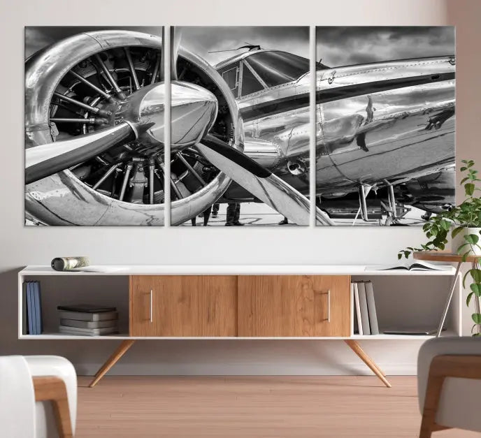 The Vintage Antique Airplane Wall Art Canvas Print, a black-and-white triptych of a propeller plane, exemplifies professional craftsmanship and adds an elegant touch to any space. This museum-quality canvas is an impressive display of artistic skill.