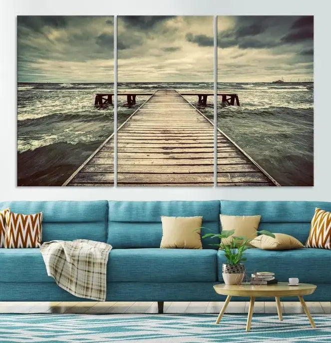 A breathtaking Vintage Wood Bridge Wall Art Canvas Print features an exquisite depiction of a wooden pier stretching into the ocean. Crafted on museum-quality canvas with a UV-protective coating, it adds the perfect touch to the modern living room aesthetic.