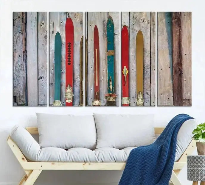 The cozy living room exudes rustic charm with the Vintage Wooden Weathered Ski's in Front of an Old Barn Wall Art Canvas Print, perfectly complementing the farmhouse decor and creating a perfect mountain retreat atmosphere.
