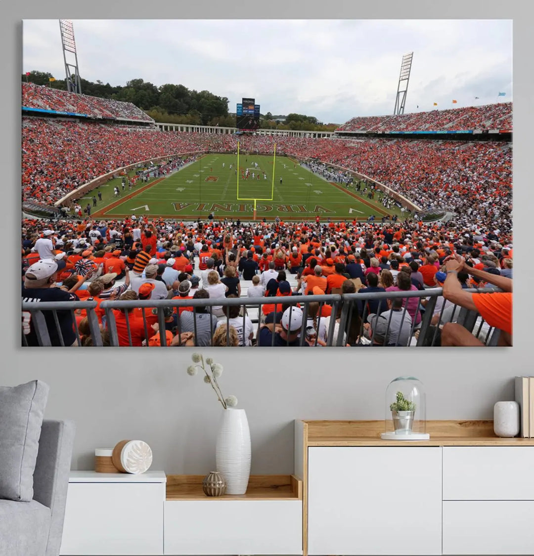 The Virginia Cavaliers Football Team Print— a premium canvas wall art of Charlottesville's Scott Stadium—beautifully enhances the modern living room.