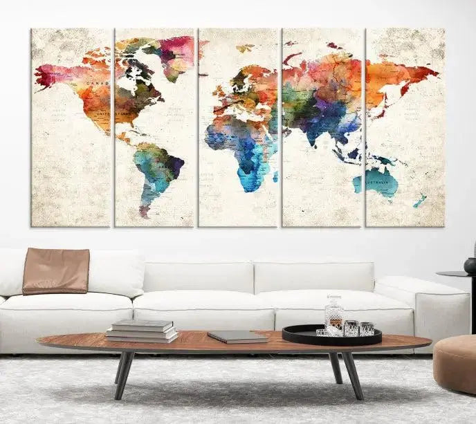 The Vivid Colors Push Pin Watercolor World Map, designed on museum-quality canvas with a flawless UV-protective coating, adorns the wall. This ready-to-hang piece adds a splash of color and elegance to any living space.