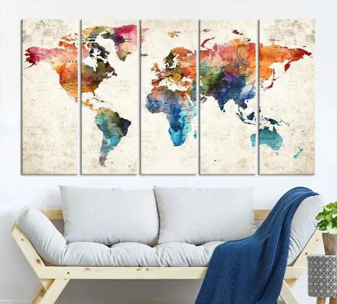The Vivid Colors Push Pin Watercolor World Map, designed on museum-quality canvas with a flawless UV-protective coating, adorns the wall. This ready-to-hang piece adds a splash of color and elegance to any living space.