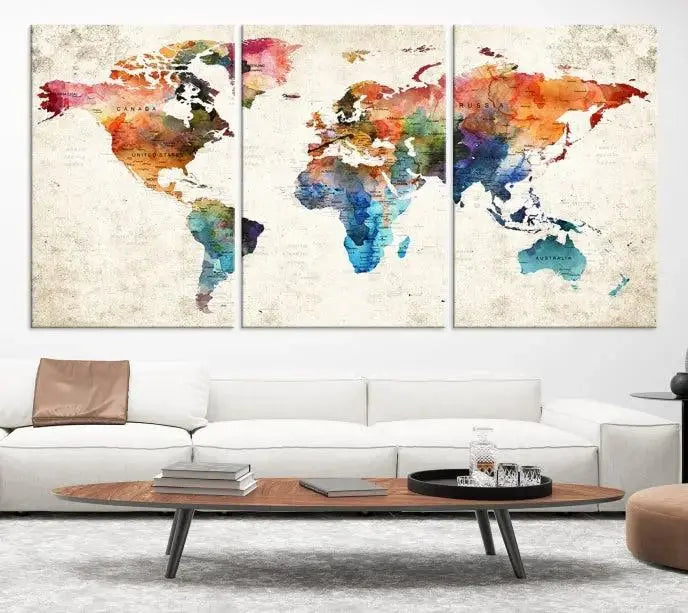 The Vivid Colors Push Pin Watercolor World Map, designed on museum-quality canvas with a flawless UV-protective coating, adorns the wall. This ready-to-hang piece adds a splash of color and elegance to any living space.