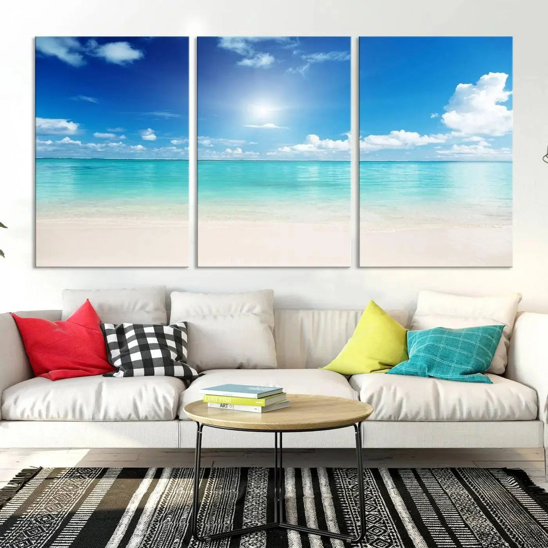 A contemporary living room showcasing the Wall Art Canvas Light Blue Beach and Ocean View.