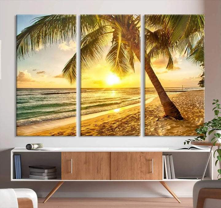 The "Wall Art Canvas Print Palm on Beach at Bright Sunset," gallery wrapped on museum-quality canvas, hangs in a dimly lit room.