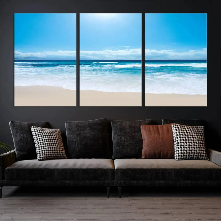 A triptych wall art canvas print titled "Shiny Blue Sea and Beach," crafted on museum-quality canvas, depicts a serene beach scene.