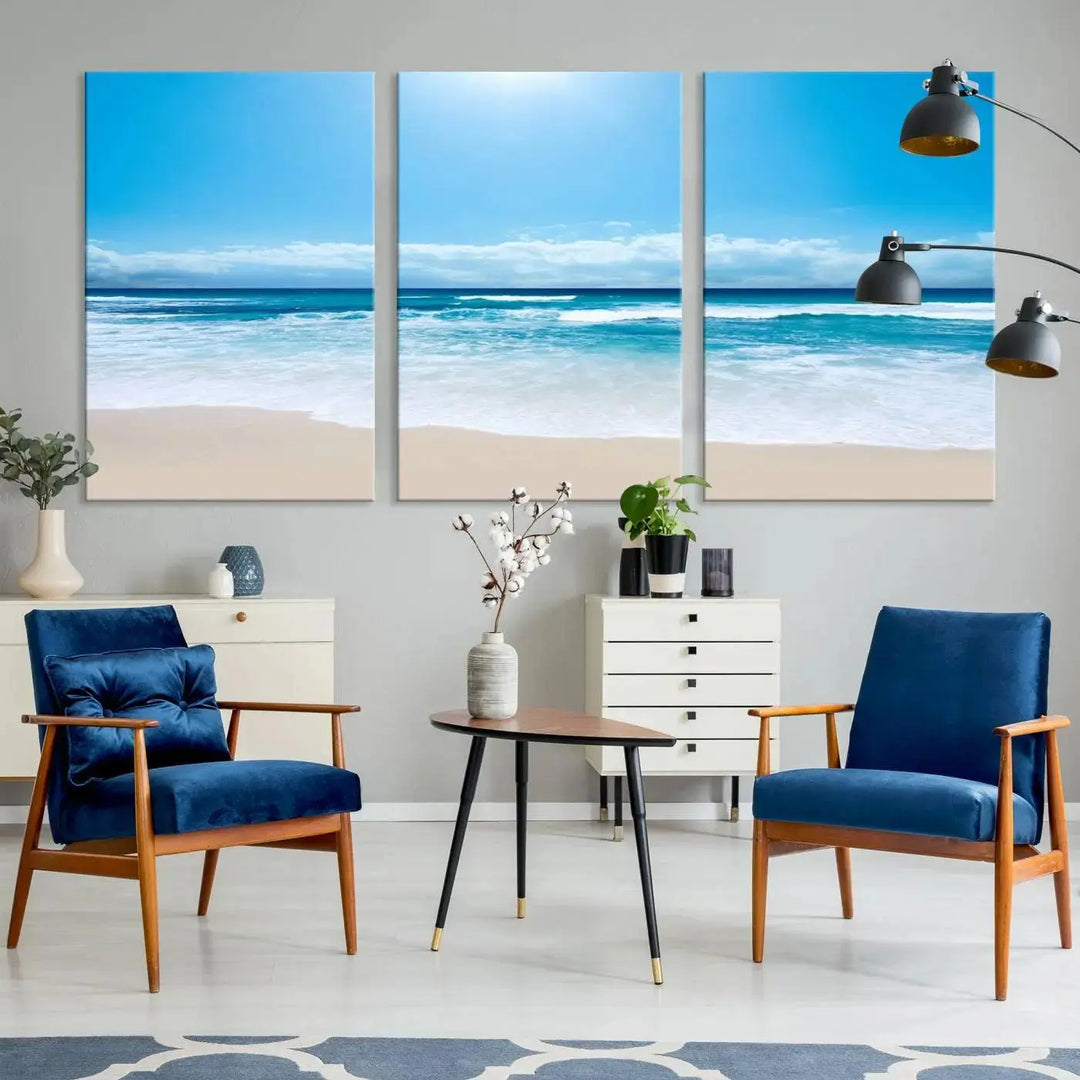 A triptych wall art canvas print titled "Shiny Blue Sea and Beach," crafted on museum-quality canvas, depicts a serene beach scene.