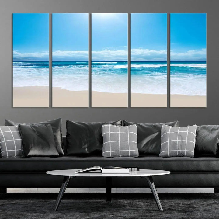 A triptych wall art canvas print titled "Shiny Blue Sea and Beach," crafted on museum-quality canvas, depicts a serene beach scene.