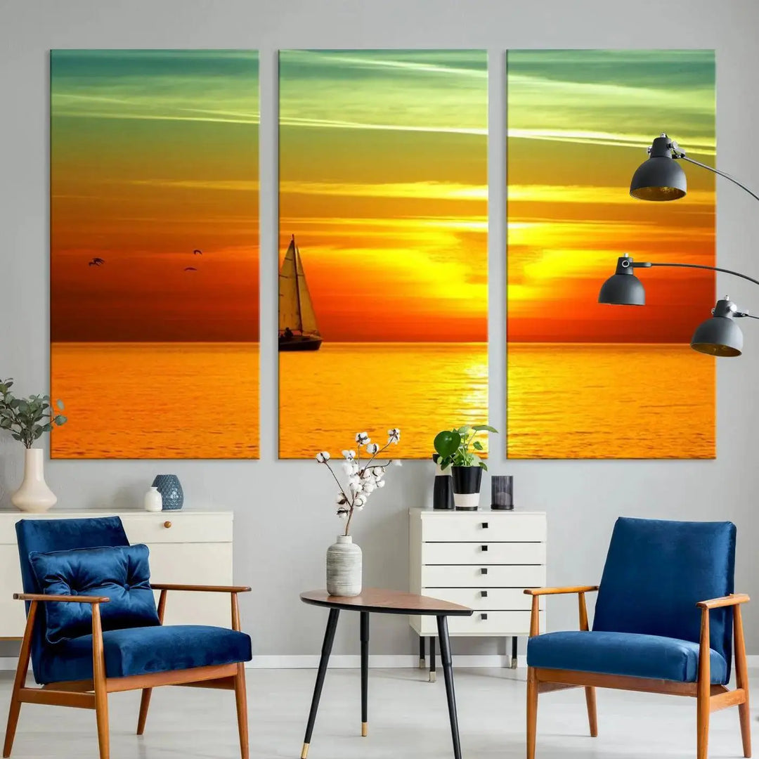 The "Wall Art Canvas Sailboat and Sailors at Sunset" is a triptych showcasing a vibrant sunset over the sea with a sailboat, elegantly displayed on gallery-wrapped, museum-quality canvas. The artworks feature a UV-protective coating to ensure their radiant colors are preserved for years to come.