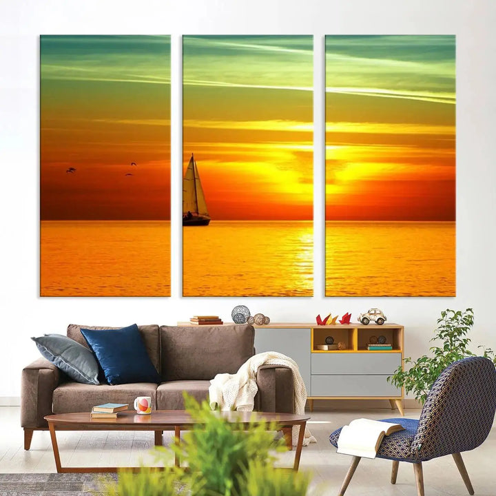 The "Wall Art Canvas Sailboat and Sailors at Sunset" is a triptych showcasing a vibrant sunset over the sea with a sailboat, elegantly displayed on gallery-wrapped, museum-quality canvas. The artworks feature a UV-protective coating to ensure their radiant colors are preserved for years to come.