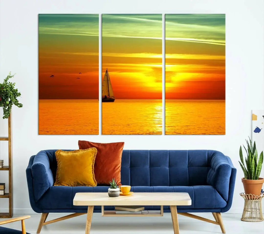 The "Wall Art Canvas Sailboat and Sailors at Sunset" is a triptych showcasing a vibrant sunset over the sea with a sailboat, elegantly displayed on gallery-wrapped, museum-quality canvas. The artworks feature a UV-protective coating to ensure their radiant colors are preserved for years to come.