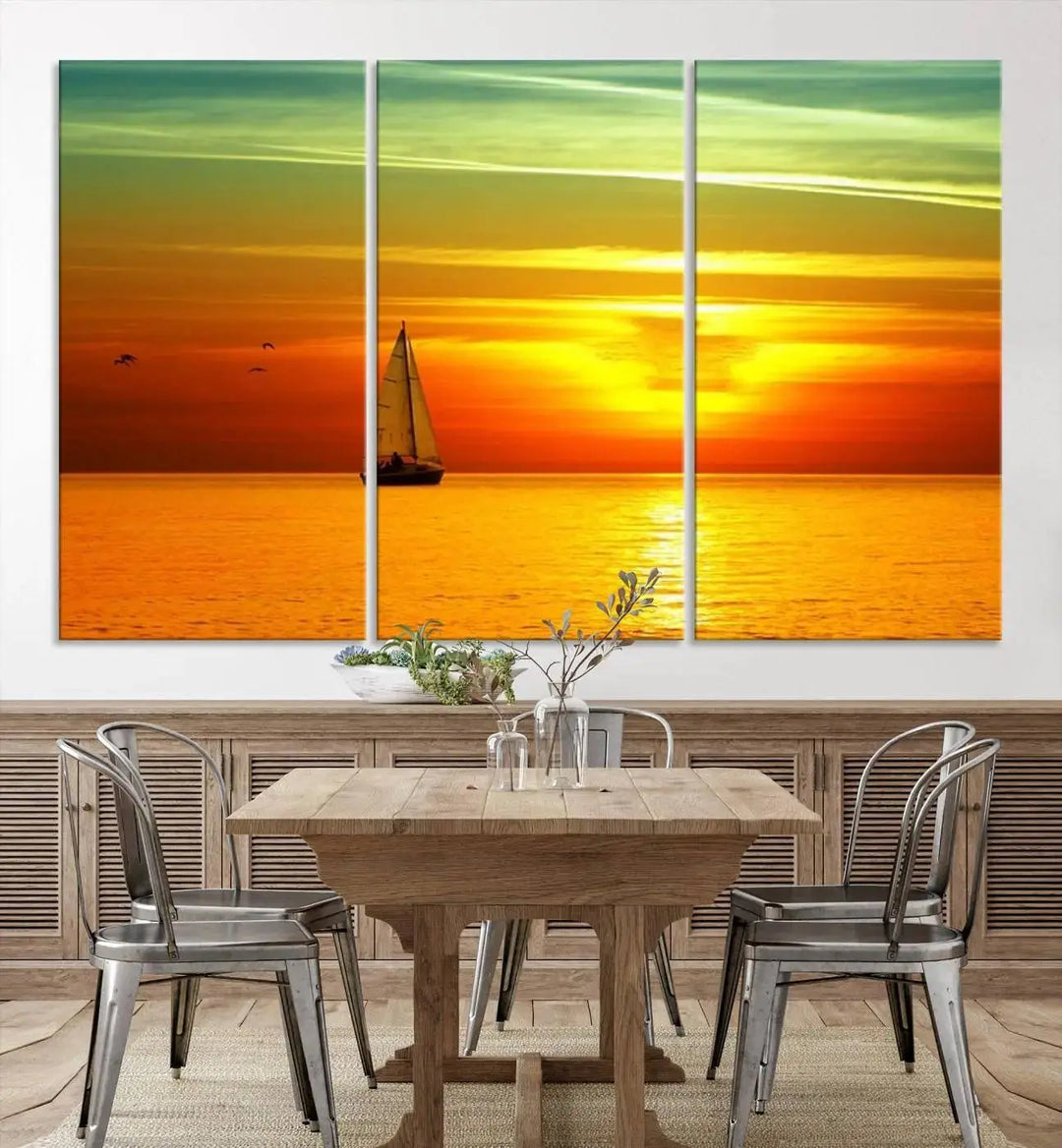 The "Wall Art Canvas Sailboat and Sailors at Sunset" is a triptych showcasing a vibrant sunset over the sea with a sailboat, elegantly displayed on gallery-wrapped, museum-quality canvas. The artworks feature a UV-protective coating to ensure their radiant colors are preserved for years to come.