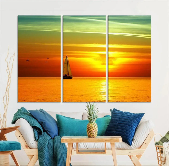 The "Wall Art Canvas Sailboat and Sailors at Sunset" is a triptych showcasing a vibrant sunset over the sea with a sailboat, elegantly displayed on gallery-wrapped, museum-quality canvas. The artworks feature a UV-protective coating to ensure their radiant colors are preserved for years to come.