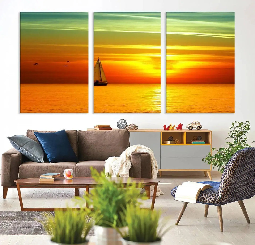 The "Wall Art Canvas Sailboat and Sailors at Sunset" is a triptych showcasing a vibrant sunset over the sea with a sailboat, elegantly displayed on gallery-wrapped, museum-quality canvas. The artworks feature a UV-protective coating to ensure their radiant colors are preserved for years to come.