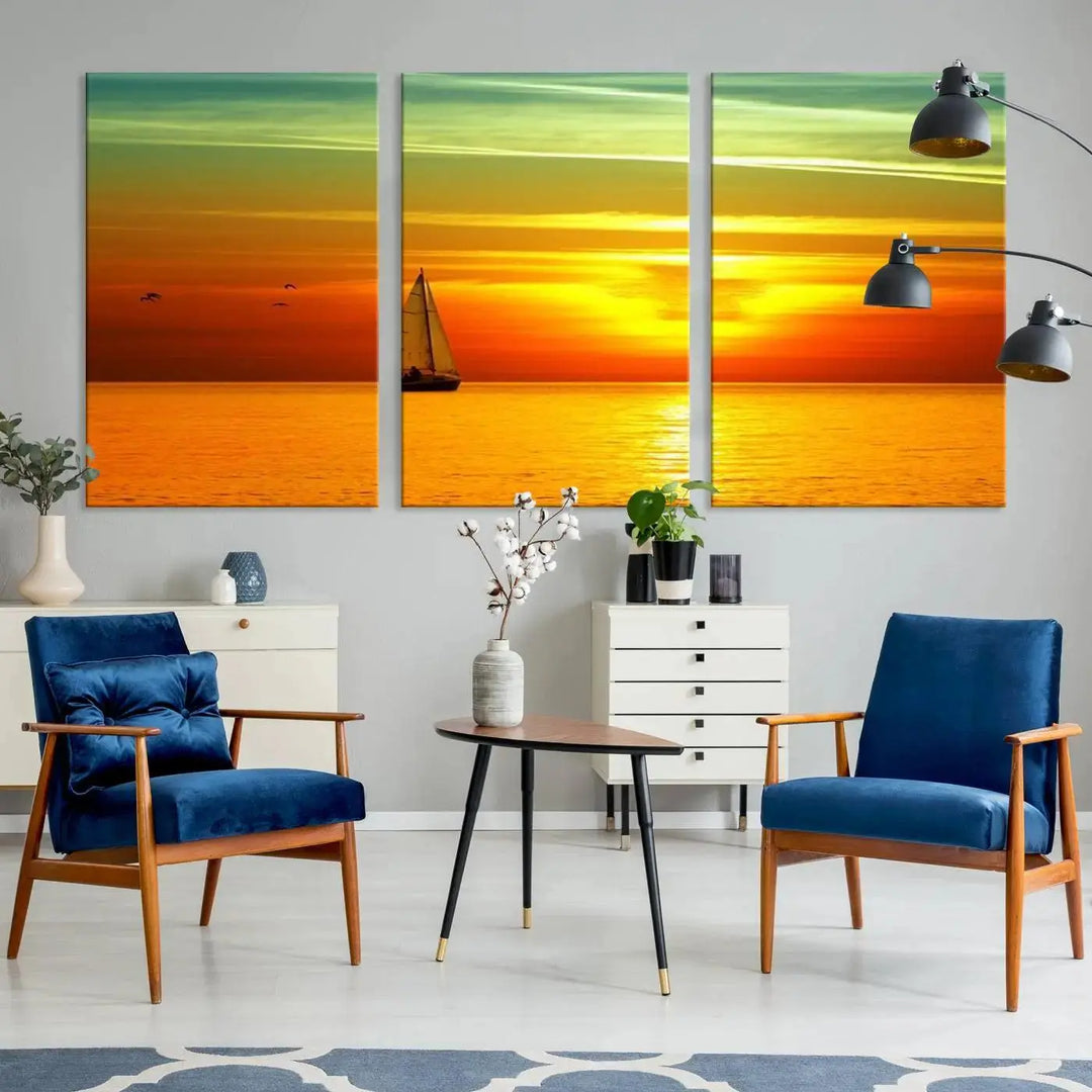 The "Wall Art Canvas Sailboat and Sailors at Sunset" is a triptych showcasing a vibrant sunset over the sea with a sailboat, elegantly displayed on gallery-wrapped, museum-quality canvas. The artworks feature a UV-protective coating to ensure their radiant colors are preserved for years to come.