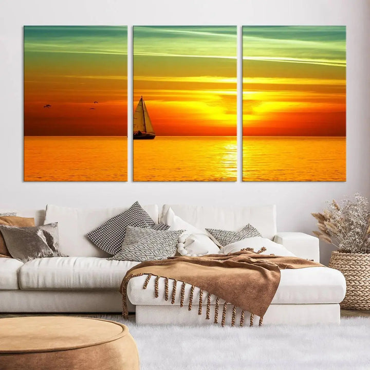 The "Wall Art Canvas Sailboat and Sailors at Sunset" is a triptych showcasing a vibrant sunset over the sea with a sailboat, elegantly displayed on gallery-wrapped, museum-quality canvas. The artworks feature a UV-protective coating to ensure their radiant colors are preserved for years to come.