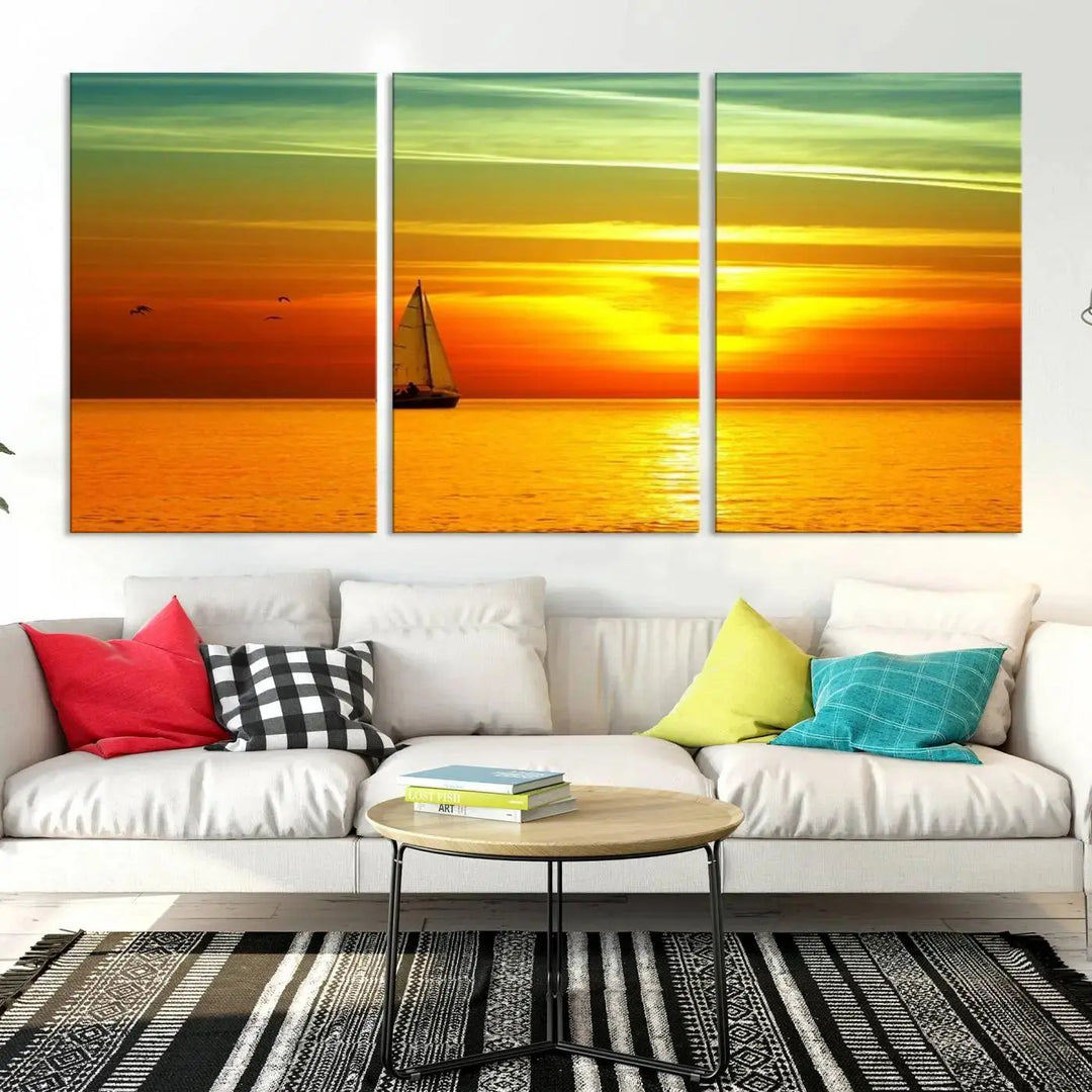 The "Wall Art Canvas Sailboat and Sailors at Sunset" is a triptych showcasing a vibrant sunset over the sea with a sailboat, elegantly displayed on gallery-wrapped, museum-quality canvas. The artworks feature a UV-protective coating to ensure their radiant colors are preserved for years to come.