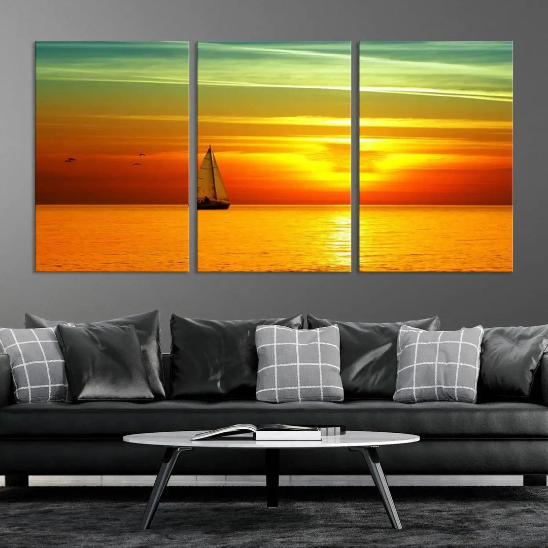 The "Wall Art Canvas Sailboat and Sailors at Sunset" is a triptych showcasing a vibrant sunset over the sea with a sailboat, elegantly displayed on gallery-wrapped, museum-quality canvas. The artworks feature a UV-protective coating to ensure their radiant colors are preserved for years to come.