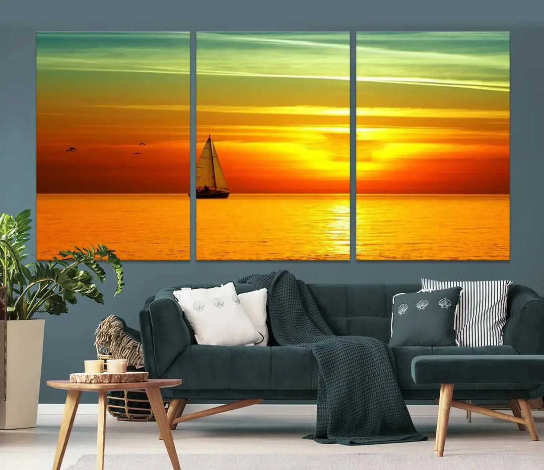 The "Wall Art Canvas Sailboat and Sailors at Sunset" is a triptych showcasing a vibrant sunset over the sea with a sailboat, elegantly displayed on gallery-wrapped, museum-quality canvas. The artworks feature a UV-protective coating to ensure their radiant colors are preserved for years to come.