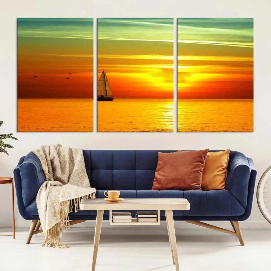 The "Wall Art Canvas Sailboat and Sailors at Sunset" is a triptych showcasing a vibrant sunset over the sea with a sailboat, elegantly displayed on gallery-wrapped, museum-quality canvas. The artworks feature a UV-protective coating to ensure their radiant colors are preserved for years to come.