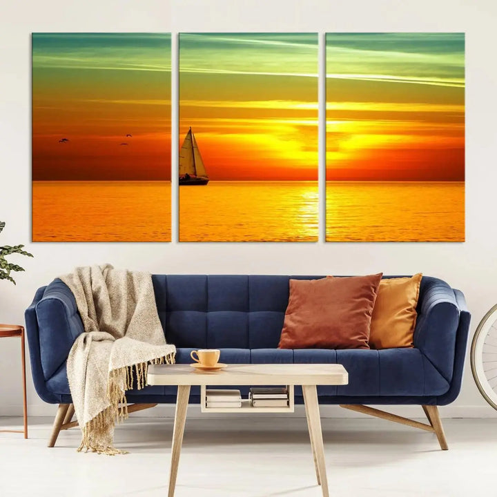 The "Wall Art Canvas Sailboat and Sailors at Sunset" is a triptych showcasing a vibrant sunset over the sea with a sailboat, elegantly displayed on gallery-wrapped, museum-quality canvas. The artworks feature a UV-protective coating to ensure their radiant colors are preserved for years to come.