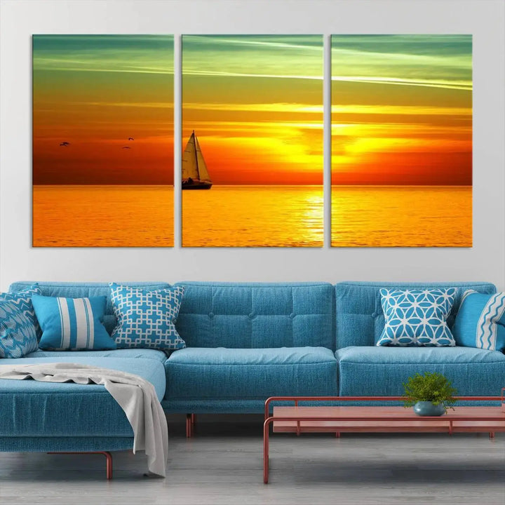 The "Wall Art Canvas Sailboat and Sailors at Sunset" is a triptych showcasing a vibrant sunset over the sea with a sailboat, elegantly displayed on gallery-wrapped, museum-quality canvas. The artworks feature a UV-protective coating to ensure their radiant colors are preserved for years to come.